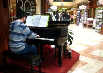 Olym Zhang performing at Springetts Arcade